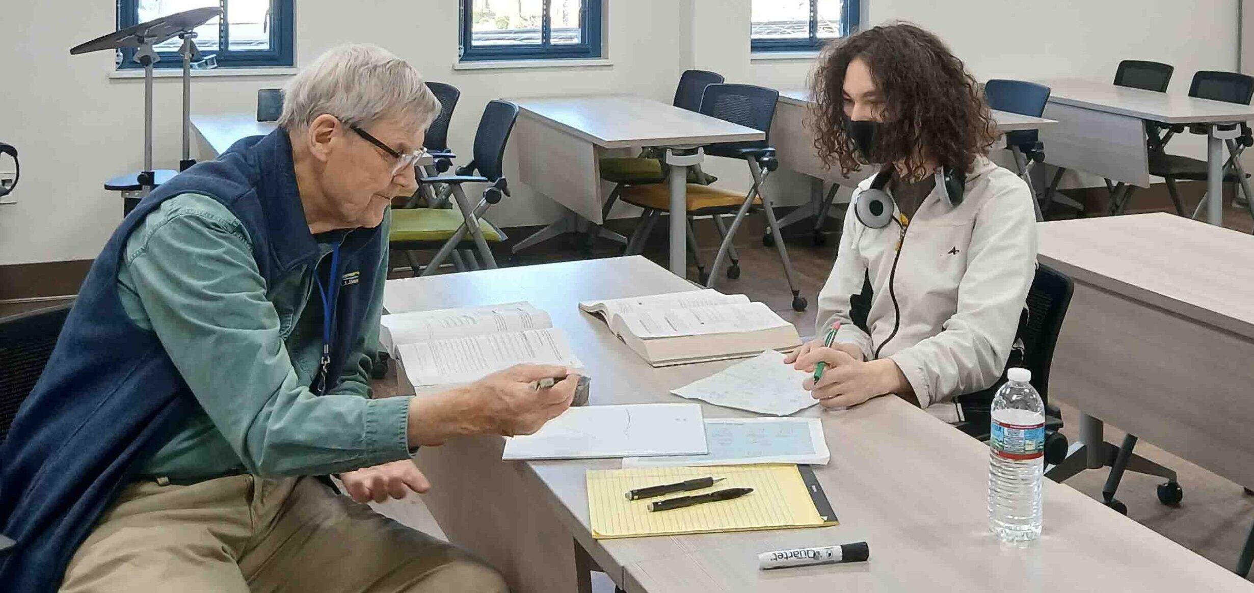 A lunch break volunteer tutoring a client